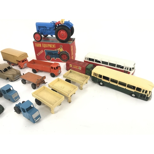 193 - A Collection of Playworn Diecast. Including Budgie. Dinky. And a Boxed Cresent Toys tractor