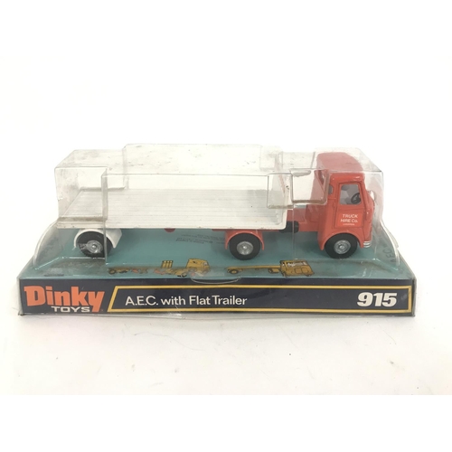 198 - A Boxed Dink A.E.C. With Flat Trailer #915.