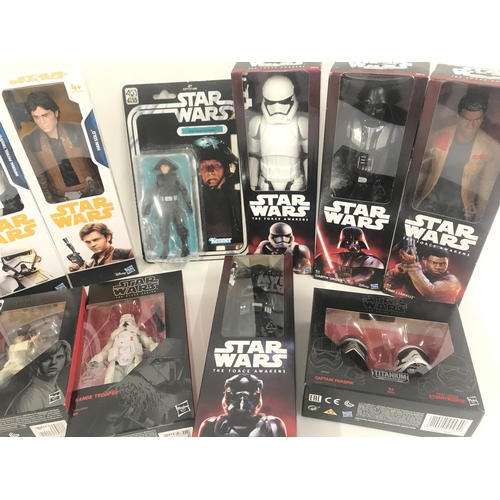 2 - A Box Containing Boxed Modern Star Wars Figures and Others.