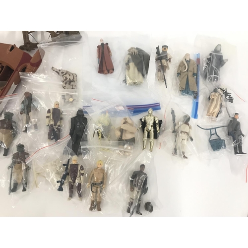 20 - A Collection of Vintage Star War Figures and Spare Parts.