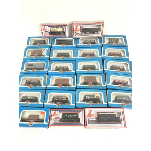 243 - A Box Containing a Collection of Boxed 00 Gauge Wagons. All Airfix and Llima.