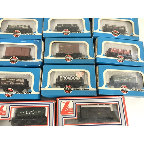 243 - A Box Containing a Collection of Boxed 00 Gauge Wagons. All Airfix and Llima.