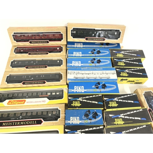 248 - A Collection of Boxed H0 Gauge Coaches and Wagons including Liliput and Piko.