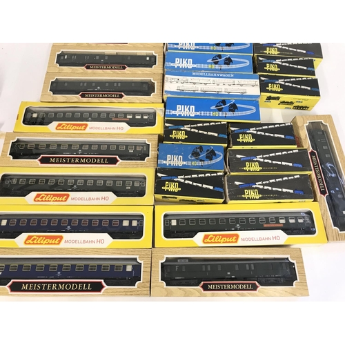 248 - A Collection of Boxed H0 Gauge Coaches and Wagons including Liliput and Piko.