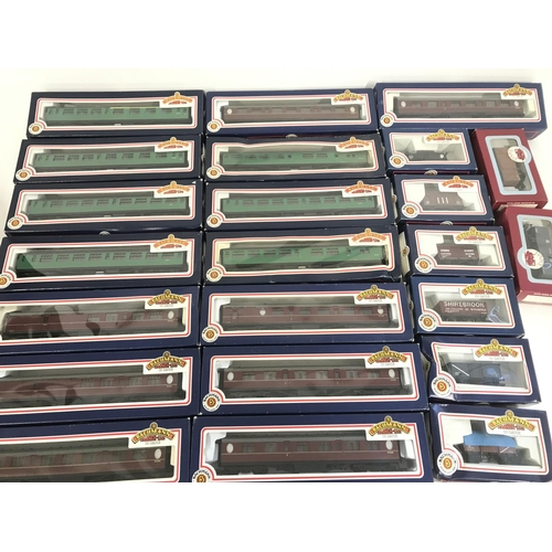 249 - A Collection of Boxed 00 Gauge Bachmann Coaches and Wagons.