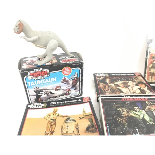 25 - A Box Containing a Collection of Vintage Star Wars Puzzles. Figures. Board Games. Etc.