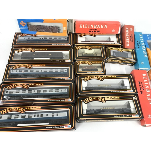 251 - collection of Boxed 00 Gauge Mainline Coaches. Wagons. And Others.