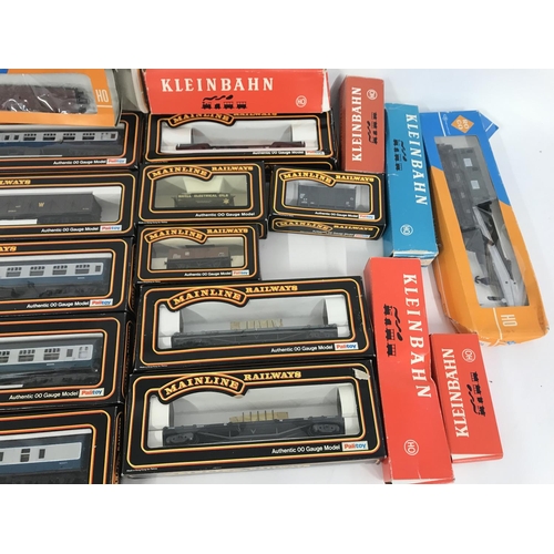 251 - collection of Boxed 00 Gauge Mainline Coaches. Wagons. And Others.