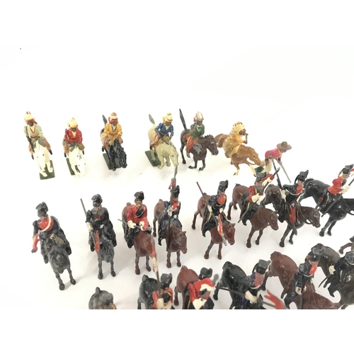 259 - A Collection of Vintage Britains. 6 Mounted Indians and a Cavalry. And Assorted Mounted Lancers. (2)... 