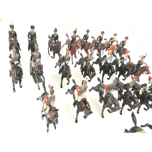 263 - A Collection of vintage Britains. Mixed Mounted Cavalry.