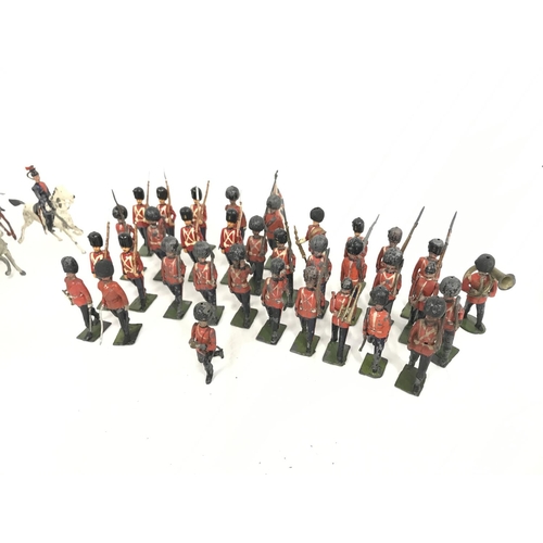 264 - A Collection of Vintage Britains including Mixed Cavalry and Guards. And a Boxed Sherwood Foresters ... 