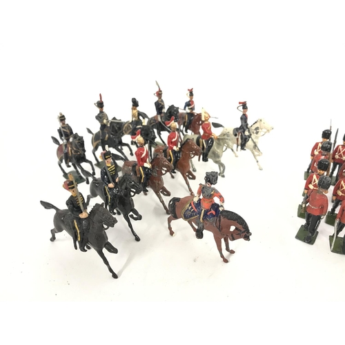 264 - A Collection of Vintage Britains including Mixed Cavalry and Guards. And a Boxed Sherwood Foresters ... 