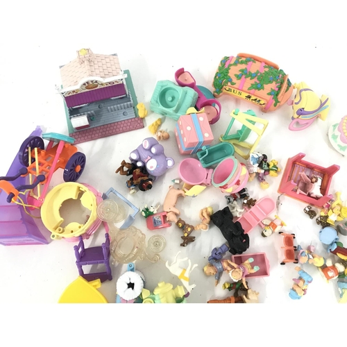 272 - A Box Containing a Large Collection of Polly Pocket buildings And Accessories and others.