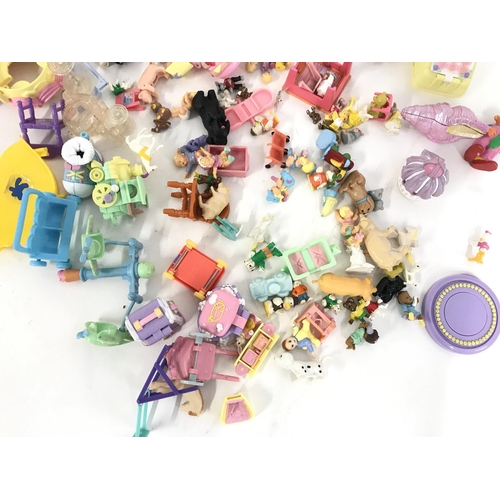 272 - A Box Containing a Large Collection of Polly Pocket buildings And Accessories and others.