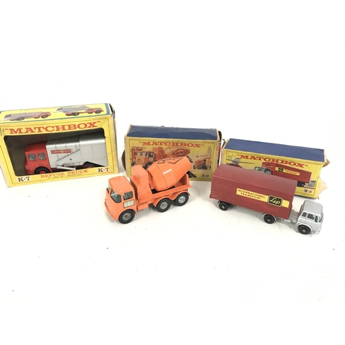 279 - A Boxed Matchbox Refuse Truck #K-7. A Ready Mix Concrete Truck #K-19. And an Articulated Freight Tru... 