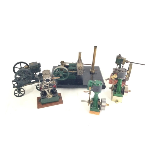 293 - A small collection of live steam engine models plus a McCormack Deering toy cart.