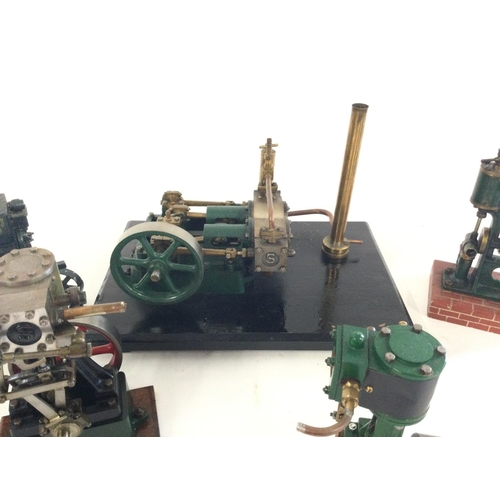 293 - A small collection of live steam engine models plus a McCormack Deering toy cart.