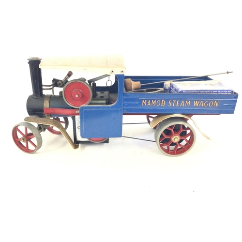 294 - A box containing a Mamod Steam Wagon, a model of a vintage ford car. Plus some Iâve steam engine m... 