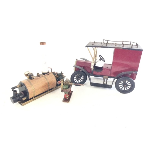 294 - A box containing a Mamod Steam Wagon, a model of a vintage ford car. Plus some Iâve steam engine m... 