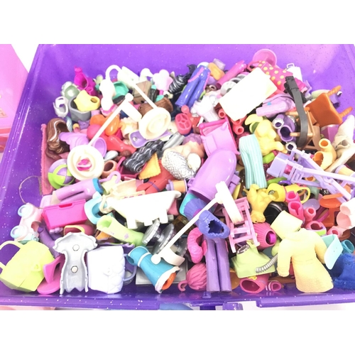 297 - A Box Containing Polly Pocket Toys. No reserve.