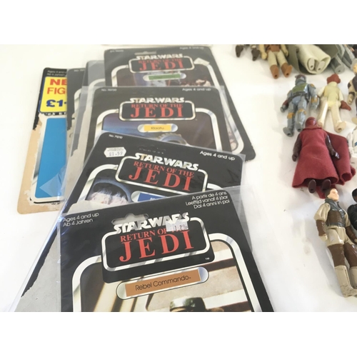 30 - A collection of vintage Star Wars figures..card backs..jigsaw