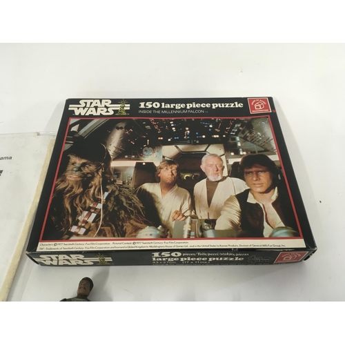 30 - A collection of vintage Star Wars figures..card backs..jigsaw