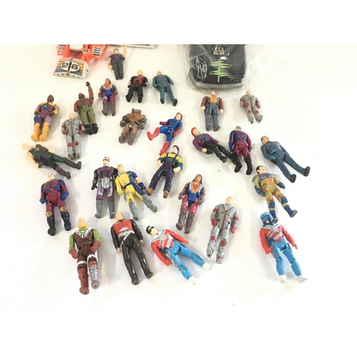 31 - A collection of vintage Mask figures and vehicles