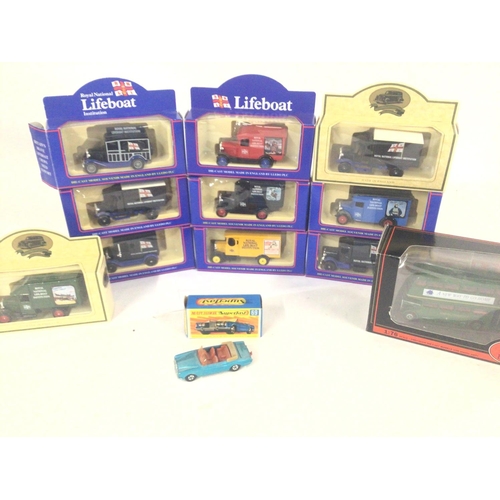 311 - A Collection of boxed Modern Diecast Buses. Lorries.Cars including Days gone and collectors books.NO... 