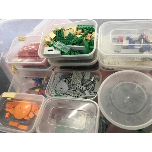 314 - A large box containing 19 plastic boxes and several bags of assorted Lego spare parts NO RESERVE