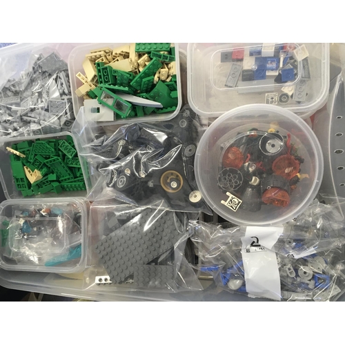 314 - A large box containing 19 plastic boxes and several bags of assorted Lego spare parts NO RESERVE