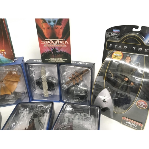 340 - A Collection of Eaglemoss Star Trek Vehicle. 2 X Star Trek Figures and 2 X Books.