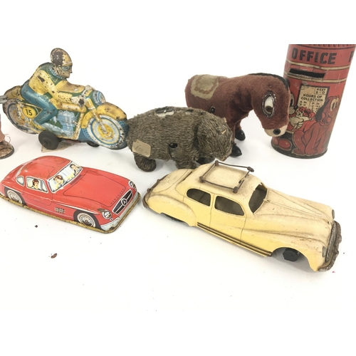 368 - A Collection of Worn Tinplate Toys. Including a Mickey Mouse Money Box. NO RESERVE