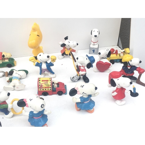 375 - A collection of Collectable Snoopy figures of varying ages. NO RESERVE