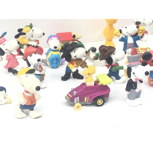 375 - A collection of Collectable Snoopy figures of varying ages. NO RESERVE
