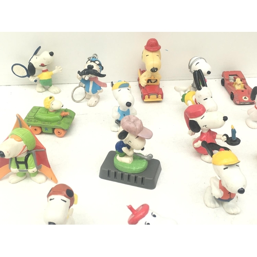 376 - A collection of 30 Collectable Snoopy figures of varying ages. NO RESERVE