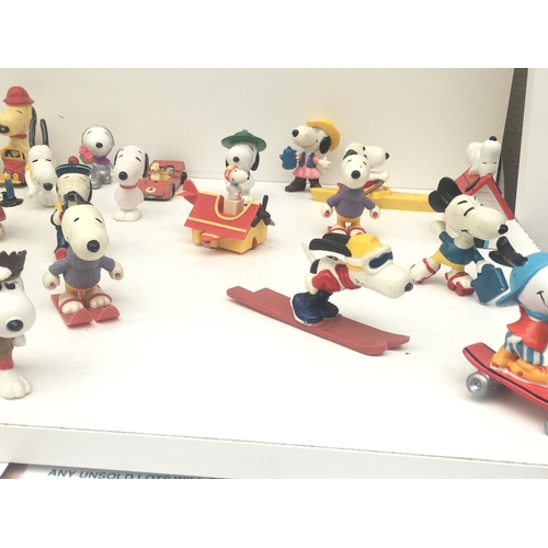 376 - A collection of 30 Collectable Snoopy figures of varying ages. NO RESERVE
