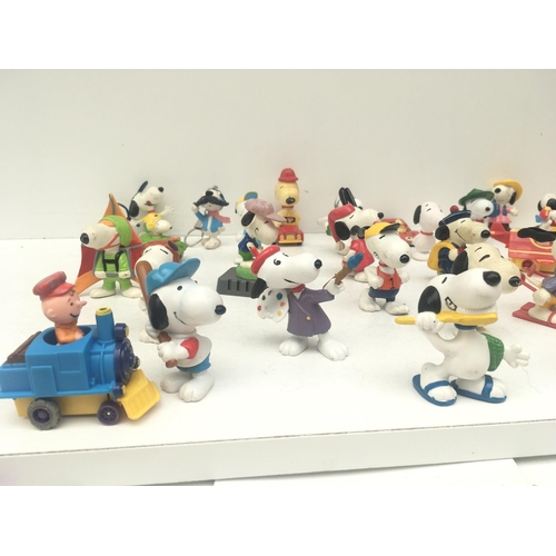 376 - A collection of 30 Collectable Snoopy figures of varying ages. NO RESERVE