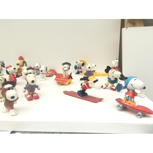 376 - A collection of 30 Collectable Snoopy figures of varying ages. NO RESERVE
