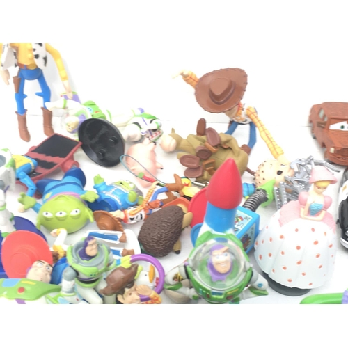 382 - A mixed collection in excess of 50 pieces containing Disney..Thunderbirds and other items. NO RESERV... 