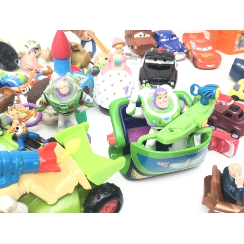 382 - A mixed collection in excess of 50 pieces containing Disney..Thunderbirds and other items. NO RESERV... 