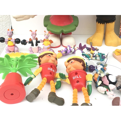 385 - A large collection of toy figures featuring Disney..Looney Tunes and others NO RESERVE