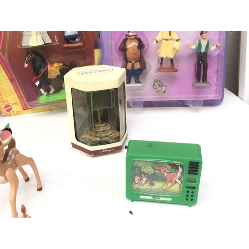 389 - A collection of mainly Disney figures including Bambi..Mulan ..Anastasia. Also includes Playmobil 38... 