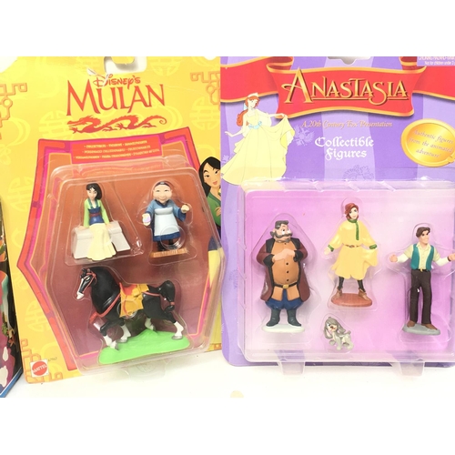 389 - A collection of mainly Disney figures including Bambi..Mulan ..Anastasia. Also includes Playmobil 38... 