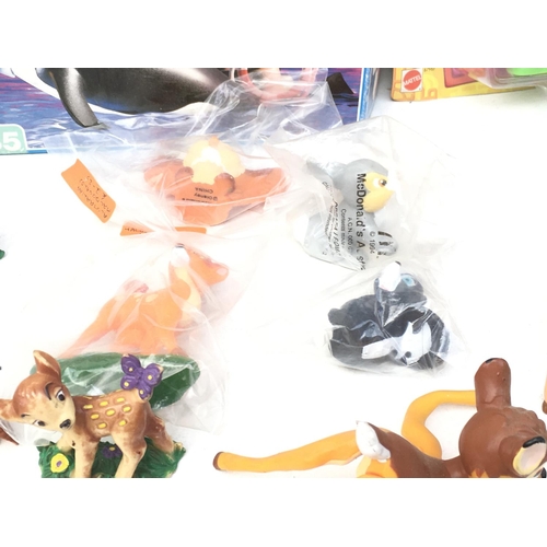 389 - A collection of mainly Disney figures including Bambi..Mulan ..Anastasia. Also includes Playmobil 38... 