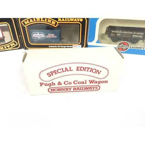 393 - A Collection of Boxed 00 Gauge Wagons. Including Hornby. Llima. Mainline.