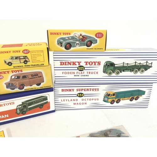 408 - A Small Collection of Boxed Atlas Dinky Toys.