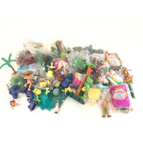 419 - A box containing quantity of sealed McDonalld Tarzan Collectables. Also Merrythought . Lund. Kimberl... 