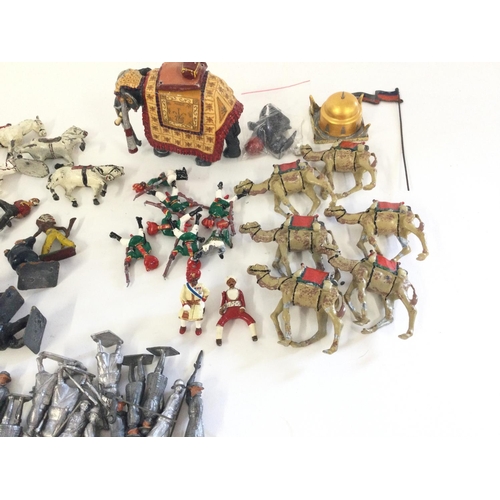 422 - A box containing a quantity of mixed Britains. Crescent lead figures to include circus. Cowboys. Sta... 