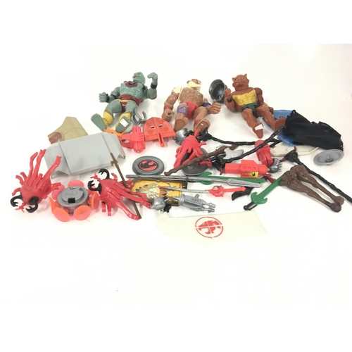 45 - A collection of of Thundercats action figures , spare parts and accessories.