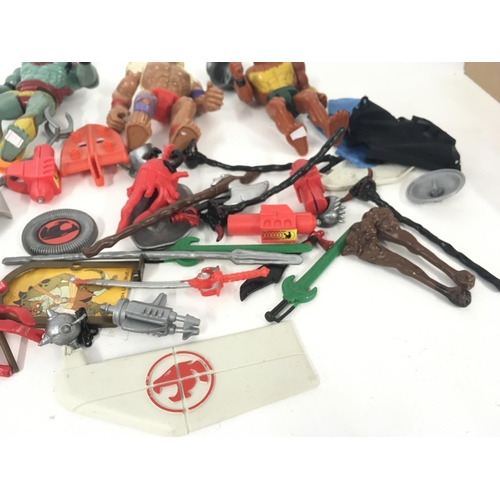 45 - A collection of of Thundercats action figures , spare parts and accessories.